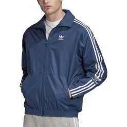 ADIDAS TRACK TOP > FM9883. Kurtki sportowe męskie Adidas, xl, bez wzorów, z poliesteru, długie, bez kaptura. Za 279,99 zł.