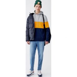 Bluza z czesanej dzianiny dresowej z panelami. Pomarańczowe bluzy męskie marki Pull&Bear, m, bez wzorów, z dzianiny, bez kołnierzyka, bez rękawów, bez kaptura. Za 89,90 zł.