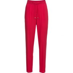 Spodnie Loose Fit bonprix czerwony. Czerwone spodnie damskie bonprix. Za 79,99 zł.