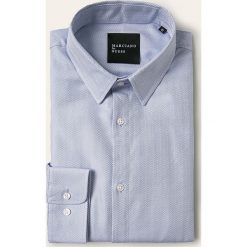 Marciano Guess - Koszula. Niebieskie koszule męskie MARCIANO GUESS, z aplikacjami, z bawełny, eleganckie, z klasycznym kołnierzykiem, z długim rękawem. W wyprzedaży za 299,90 zł.
