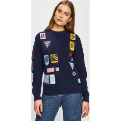 Calvin Klein Jeans - Sweter. Niebieskie swetry damskie Calvin Klein Jeans, s, z aplikacjami, z bawełny, z krótkim rękawem, krótkie, bez kaptura. W wyprzedaży za 299,90 zł.