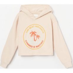Bawełniana bluza dresowa z kapturem - Beżowy. Brązowe bluzy damskie Reserved, bez wzorów, z bawełny, bez rękawów, z kapturem. W wyprzedaży za 29,99 zł.