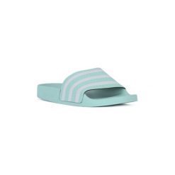 Klapki adidas ADILETTE W. Białe klapki damskie Adidas, bez wzorów, bez obcasa. Za 184,16 zł.