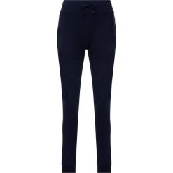 Spodnie dresowe Guess Greig M93B22 K6ZS0. Niebieskie jeansy męskie Guess, xxl, z aplikacjami, z jeansu. W wyprzedaży za 219,00 zł.