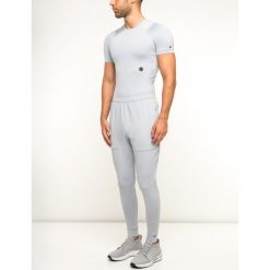 Spodnie dresowe Under Armour UA Rush 1328702. Szare jeansy męskie Under Armour, xl, bez wzorów. W wyprzedaży za 159,00 zł.