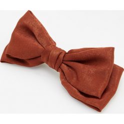 Spinka kokarda - Pomarańczowy. Pomarańczowe spinki do włosów damskie Reserved. W wyprzedaży za 19,99 zł.