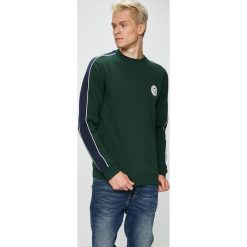 DC - Bluza. Żółte bluzy męskie DC, xl, z nadrukiem, z bawełny, z okrągłym kołnierzem, bez rękawów, bez kaptura. W wyprzedaży za 99,90 zł.