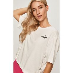 Puma - T-shirt. Żółte bluzki damskie Puma, s, z nadrukiem, z elastanu, casualowe, z okrągłym kołnierzem, z krótkim rękawem. Za 89,90 zł.