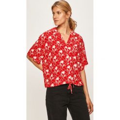 Levi's - Koszula. Pomarańczowe bluzki damskie Levi's®, s, bez wzorów, z wiskozy, casualowe, bez kołnierzyka, z krótkim rękawem. W wyprzedaży za 199,90 zł.