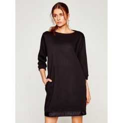 Sukienka dzianinowa Emporio Armani 3H2A7E 2J60Z 0999. Czarne sukienki damskie Emporio Armani, bez wzorów, z bawełny, bez kołnierzyka, bez rękawów. W wyprzedaży za 659,00 zł.