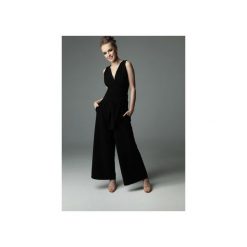 Kombinezon Blade Babe - czarny. Czarne kombinezony damskie marki Madnezz, s, w paski, z elastanu, eleganckie, bez kołnierzyka, bez rękawów. Za 359,00 zł.