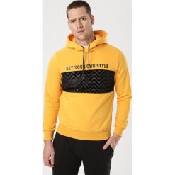Żółta Bluza Euphetia. Żółte bluzy męskie Born2be, xl, bez wzorów, bez kołnierzyka, bez rękawów, bez kaptura. Za 79,99 zł.