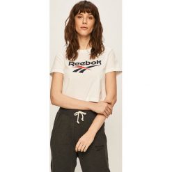 Reebok Classic - T-shirt. Białe topy damskie Reebok Classic, s, z nadrukiem, z elastanu, z okrągłym kołnierzem. Za 79,90 zł.