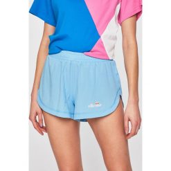 Ellesse - Szorty. Pomarańczowe spodenki sportowe damskie Ellesse, bez wzorów, z elastanu, sportowe. W wyprzedaży za 99,90 zł.