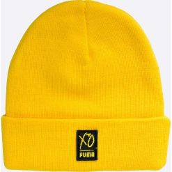 Puma - Czapka Puma x XO The Weeknd. Żółte czapki zimowe męskie Puma, na zimę, z dzianiny. W wyprzedaży za 89,90 zł.