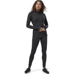 Bluza do biegania damska REEBOK OS THERMO T SCUBA H BLACK / CY2448. Czarne bluzy damskie Reebok, bez wzorów, bez rękawów, bez kaptura. Za 279,00 zł.