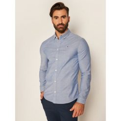 Koszula Tommy Jeans Oxford DM0DM09594. Białe koszule męskie Tommy Jeans, xs, bez wzorów, z jeansu, casualowe, bez kołnierzyka, bez rękawów. Za 309,00 zł.