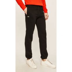 Lacoste - Spodnie. Czarne spodnie męskie Lacoste, na co dzień, s, bez wzorów, z bawełny. W wyprzedaży za 299,90 zł.