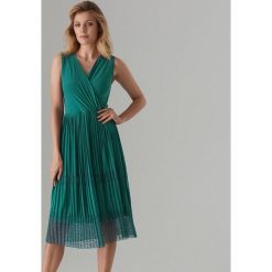 Plisowana midi sukienka - Turkusowy. Niebieskie sukienki damskie Mohito, m, bez wzorów, bez kołnierzyka, bez rękawów, midi. Za 159,99 zł.
