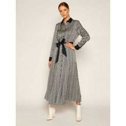 Sukienka koszulowa TOMMY HILFIGER ICONS Tilda WW0WW28523. Niebieskie sukienki damskie TOMMY HILFIGER, na co dzień, bez wzorów, z koszulowym kołnierzykiem, bez rękawów, proste. Za 899,00 zł.