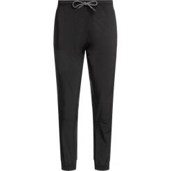 Spodnie dresowe DKNY Sport DP9P1788. Czarne spodnie damskie DKNY Sport, s, z elastanu. W wyprzedaży za 209,00 zł.