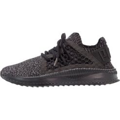 Puma TSUGI NETFIT EVOKNIT Tenisówki i Trampki black/steel gray. Czarne trampki i tenisówki damskie marki Puma, z tworzywa sztucznego. W wyprzedaży za 407,20 zł.