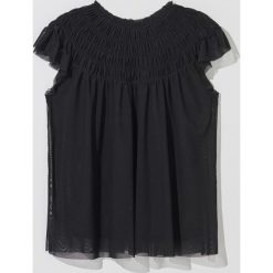 Bluzka z dzianiny mesh - Czarny. Czarne bluzki damskie Mohito, s, bez wzorów, z dzianiny, bez kołnierzyka, bez rękawów. Za 69,99 zł.