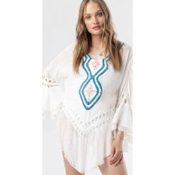Biała Tunika Raylee. Białe tuniki damskie Born2be, s, bez wzorów, bez kołnierzyka, bez rękawów. W wyprzedaży za 64,99 zł.