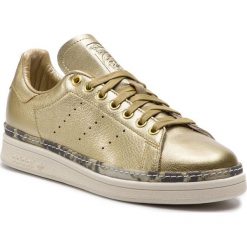 Buty adidas - Stan Smith New Bold W F34120 Goldmt/Goldmt/Owhite. Żółte buty sportowe damskie Adidas, bez wzorów, ze skóry, sportowe, adidas stan smith. W wyprzedaży za 329,00 zł.