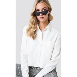 NA-KD Trend Koszula jeansowa z surowym brzegiem - White. Białe koszule damskie marki NA-KD Trend, z jeansu. W wyprzedaży za 80,97 zł.