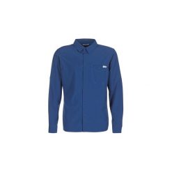 Koszule z długim rękawem Columbia TRIPLE CANYON SOLID LONG SLEEVE SHIRT. Niebieskie koszule męskie marki Columbia, s, bez wzorów, bez kołnierzyka, z długim rękawem. Za 247,20 zł.