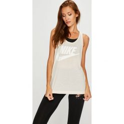 Nike Sportswear - Top. Szare topy damskie Nike Sportswear, m, z nadrukiem, z dzianiny, z okrągłym kołnierzem. W wyprzedaży za 99,90 zł.