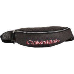 Saszetka nerka CALVIN KLEIN - Monogram Waistbag K60K605637 0HD. Pomarańczowe nerki damskie Calvin Klein, bez wzorów, ze skóry ekologicznej, młodzieżowe, bez dodatków. Za 359,00 zł.