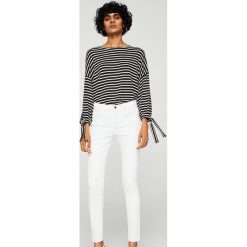 Mango - Jeansy Belle2. Białe rurki damskie marki Mango, z podwyższonym stanem. Za 139,90 zł.