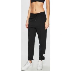 Nike Sportswear - Spodnie. Czarne spodnie damskie marki Nike Sportswear, s, z bawełny. Za 229,90 zł.