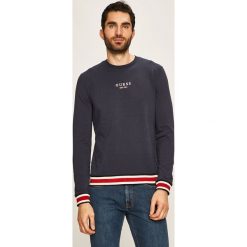 Guess Jeans - Bluza. Niebieskie bluzy męskie Guess Jeans, s, z nadrukiem, z elastanu, z okrągłym kołnierzem, bez rękawów, bez kaptura. W wyprzedaży za 239,90 zł.