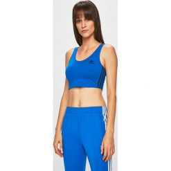 Adidas Originals - Top. Niebieskie topy damskie adidas Originals, s, bez wzorów, z elastanu, z okrągłym kołnierzem. W wyprzedaży za 79,90 zł.