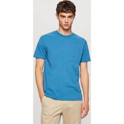 T-shirt z bawełny organicznej - Niebieski. Niebieskie t-shirty damskie marki Reserved, s, bez wzorów, z bawełny, bez kołnierzyka. Za 79,99 zł.