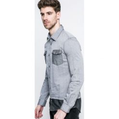Guess Jeans - Koszula. Szare koszule męskie marki Guess Jeans, s, z aplikacjami, z bawełny, klasyczne, z klasycznym kołnierzykiem, z długim rękawem. W wyprzedaży za 139,90 zł.
