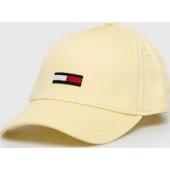 Tommy Jeans - Czapka. Żółte czapki damskie Tommy Jeans, bez wzorów, z bawełny. W wyprzedaży za 89,90 zł.