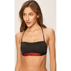 Calvin Klein Jeans - Biustonosz kąpielowy. Czarne stroje kąpielowe damskie Calvin Klein Jeans, s, bez wzorów, z elastanu. W wyprzedaży za 159,90 zł.