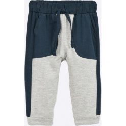 Blukids - Spodnie dziecięce 68-98 cm. Szare spodnie chłopięce marki Blukids, z bawełny. W wyprzedaży za 29,90 zł.