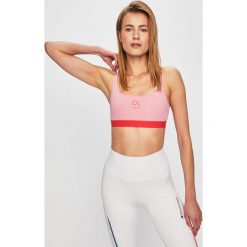 Calvin Klein Performance - Biustonosz. Czarne biustonosze sportowe damskie Calvin Klein Performance, xs, bez wzorów, z elastanu. W wyprzedaży za 129,90 zł.