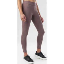 Brązowe Legginsy Kelesha. Pomarańczowe legginsy damskie Born2be, s, bez wzorów. Za 69,99 zł.