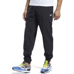 REEBOK RAINING ESSENTIALS WOVEN CUFFED > FP9141. Spodnie męskie Reebok, s, bez wzorów, ze skóry, street. Za 149,99 zł.