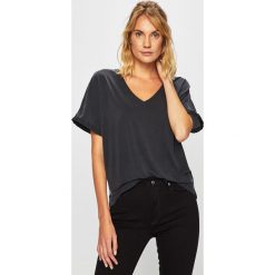 G-Star Raw - Bluzka. Czarne bluzki damskie G-Star RAW, s, bez wzorów, z elastanu, retro, bez kołnierzyka, z krótkim rękawem. W wyprzedaży za 229,90 zł.