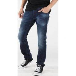 Diesel Thavar Dżinsy Niebieski. Niebieskie jeansy męskie Diesel, bez wzorów. Za 843,95 zł.
