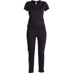 Rich & Royal OVERALL Kombinezon deep blue. Niebieskie kombinezony damskie marki Rich & Royal, xs, z bawełny. Za 549,00 zł.