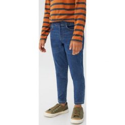 Mango Kids - Jeansy dziecięce Comfy 110-164 cm. Zielone spodnie chłopięce Mango Kids, bez wzorów, z elastanu. W wyprzedaży za 59,90 zł.