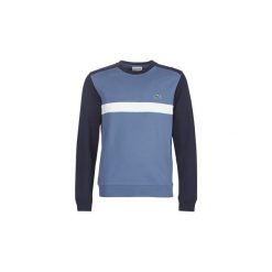 Bluzy Lacoste SH0862. Niebieskie bluzy męskie Lacoste, s, bez wzorów, bez kołnierzyka, bez rękawów, bez kaptura. Za 579,00 zł.